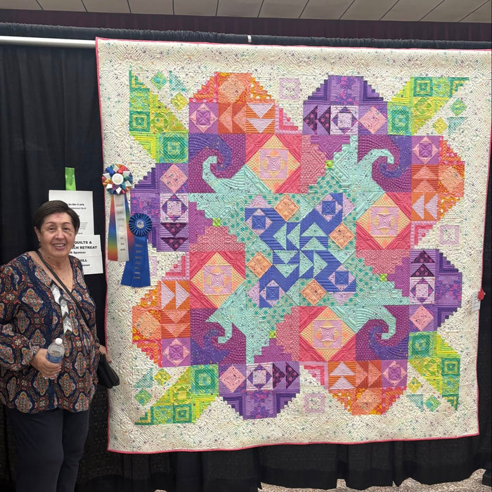 Dragon fruit quilted on longarm computerized machine by Bernadette Faris